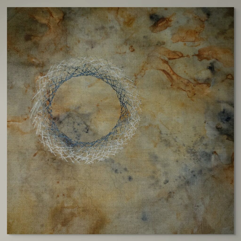 Textile artwork stained through galvanic corrosion between iron and copper with walnut eco-printing, overlaid with stitched forms suggesting a glowing corona and cosmic patterns.